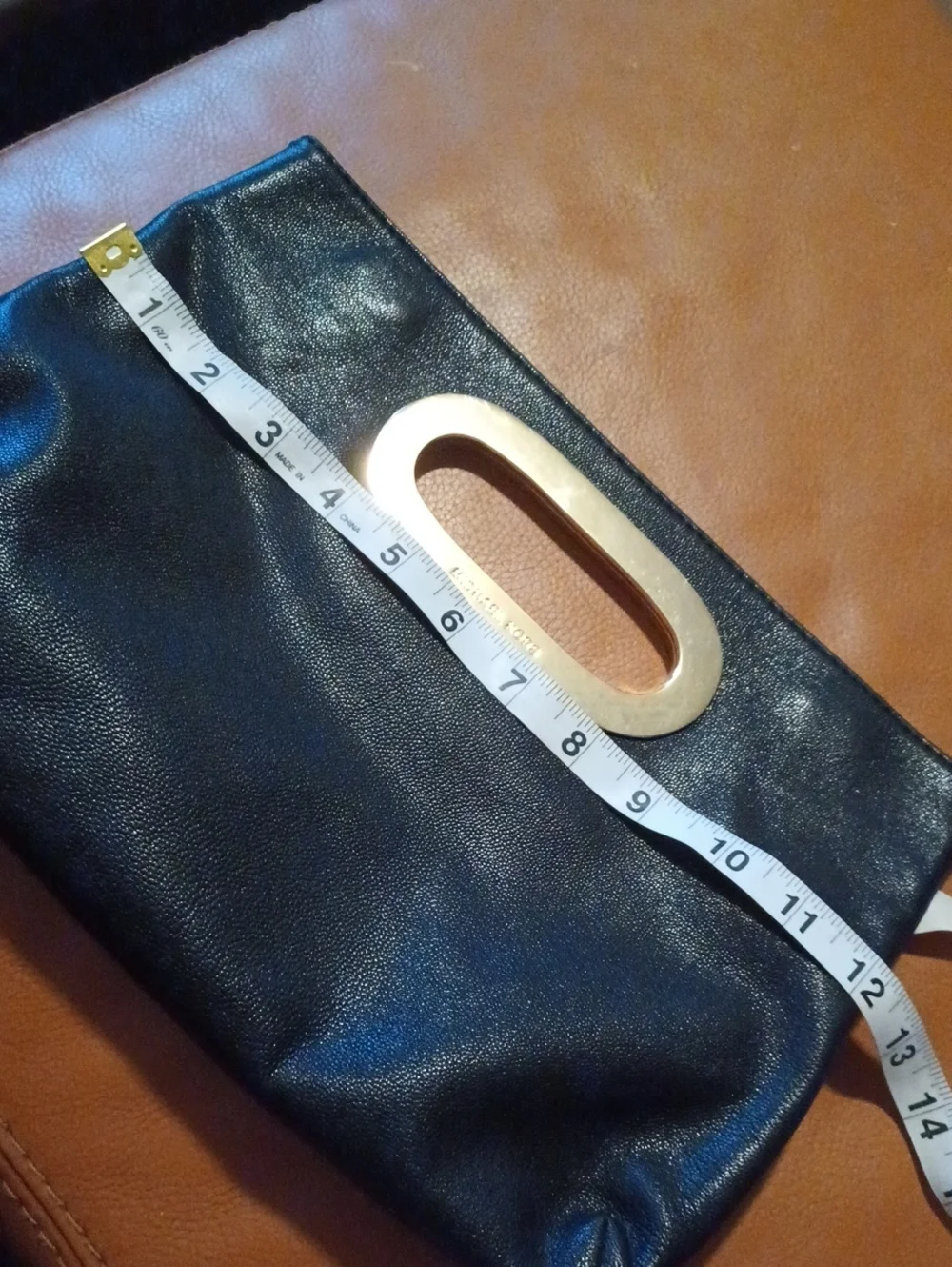 > Michael Kors Black Leather Women's Clutch with Gold Hardware